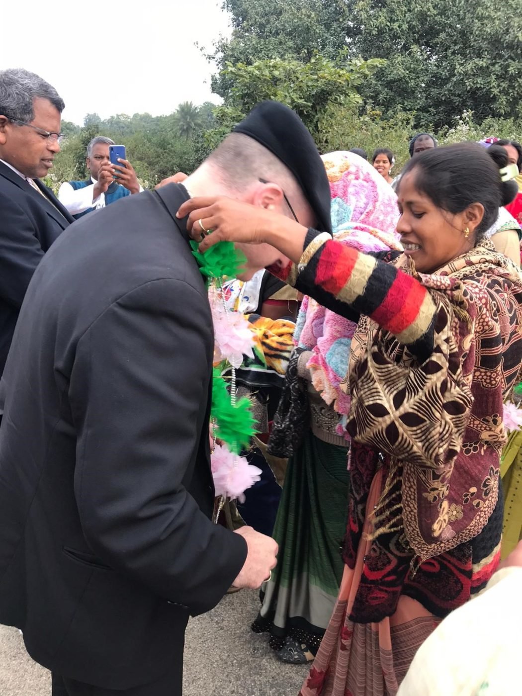 People greet Bishop McKnight in Kunkuri.